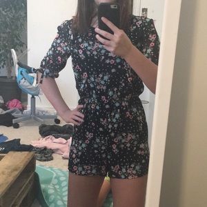 Black romper with flowers